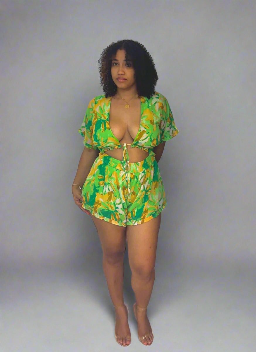 Orange print open belly romper