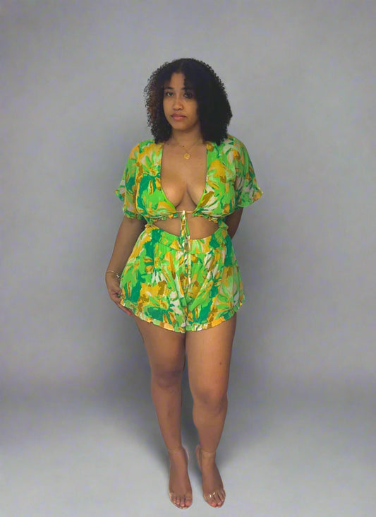 Orange print open belly romper